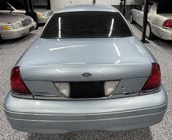Image result for Light Ice Blue 2003 Crown Victoria