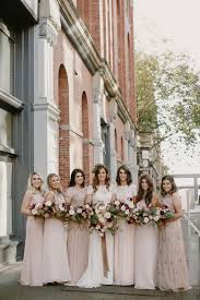 Modern Seattle Warehouse Wedding At The Foundry Portraits In Pioneer Square Bridal Party In Pink Floor Length Dress Seattle Wedding Wedding Warehouse Wedding