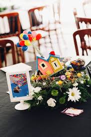 These Two Made Amazing Disney Themed Centerpieces Out Of Their Childhood Toys Disney Wedding Centerpieces Disney Centerpieces Disney Up Wedding