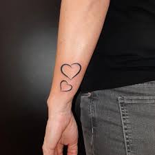 An arm tattoo can very well accentuate the sporty and masculine appeal of a unique arm tattoo for men. Heart Tattoo Men Simple Novocom Top