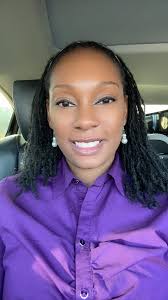 Can someone make this a professional headshot with a nice background and  make my shirt look better?