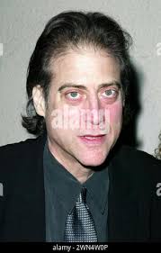 Beverly Hills, California. 27th November, 2020. Art consultant /curator  Michael Sean Degnan and TV Host Joey Zhou at the red carpet entrance to the  Winn Slavin Fine Art Gallery in Beverly Hills,