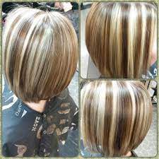 Slight Asymmetrical Bob With Blonde Highlights And Medium Golden Brown Lowlights Medium Bob Hairstyles Thick Hair Styles Medium Bob Hairstyles For Thick