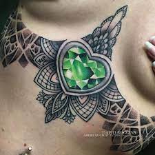 Emerald Heart Sternum Tattoo Tattoo Ideas And Inspiration Sternum Tattoo Tattoos Slipknot Tattoo