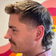 What are some good queer-owned barber shops/salons in Lawrence that can cut  curly hair?