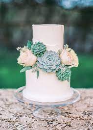 A Simple Two Tiered White Wedding Cake With Fresh Flowers And Succulents Rustic Cream Blus Succulent Wedding Cakes Wedding Cake Toppers Wedding Cake Options