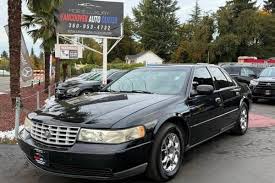 Image result for Black Sapphire 1993 Seville
