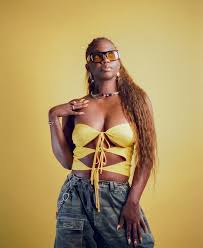 It's giving early 2000s music video vixen” Thank you, Ms. Charles 📸🎞️