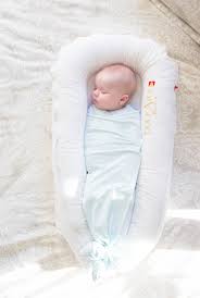 Check spelling or type a new query. A Sleeping Baby The Dock A Tot And Ollie Swaddle Easy Elegant Entertaining