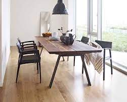 This glass table is a miracle of design. Solid Wood Dining Tables Luxury Dining Tables Wharfside