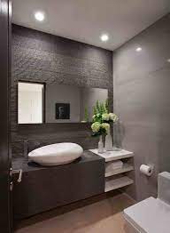 This sleek modern bathroom combines form and function into a relaxing living space that is in tune with nature. Modern Guest Bathroom Remodel Trendecors