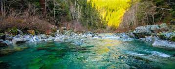 A river is a natural waterway that conveys water derived from precipitation from higher ground to lower levels. What Makes A River Different Colors American Rivers