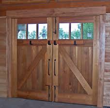 I've wanted a carriage garage door for awhile, but i didn't want to spend the money on a new door. Have Garage Building Subjects On The Brain Lately So How About A Little Inspiration For Carriage Doors Exterior Barn Doors Carriage House Doors Old Barn Doors