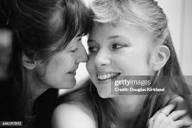 Actress Rebecca De Mornay being hugged by her mother Julie De Mornay...  News Photo