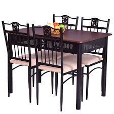 Apr 17, 2020 · the table is fitted with four matching dining chairs in a triangular shape which are hidden underneath the table. Casart 5 Pcs Dining Table And Chairs Set Vintage Retro Wood Top Metal Frame Padded Seat Dining Table Set Home Kitchen Dining Room Furniture Buy Online In Angola At Desertcart 105482527