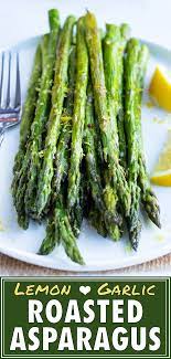 Roasted Asparagus Recipe With Garlic Evolving Table Recipe Asparagus Recipes Roasted Asparagus Recipes Baked Roasted Asparagus