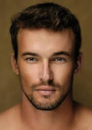 He could be from Lauren Dane's Chase brother's series...sigh