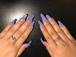 In a world of ballerina, stiletto and almond, coffin shaped nails beg to differ! Lilac Coffin Nails Nails Nail Inspo Acrylic Nails