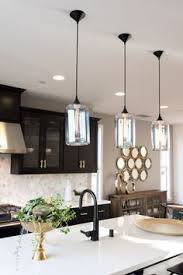 A Classic Black And Gold Kitchen Deserves Classic Pendants Kitchen Lighting Design Kitchen Island Lighting Pendant Boho Kitchen