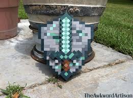 You need to make sure you do this because if you don't have the right timing attempting to block hit will be useless. Minecraft Diamond Sword And Display Shield Wood Block Wall Art Minecraft Diamond Sword Wood Blocks Diamond Sword
