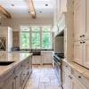 Kitchen floor tile ideas with white cabinets. 1