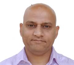 Dr. Mila Mitra Dr.(Hon).M.R.K Menon