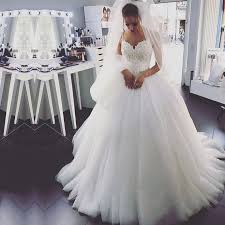 You can find more interesting silhouettes and necklines to try. 2018 Wedding Gowns Long Train Spaghetti Straps Lace Appliques Ball Gown White
