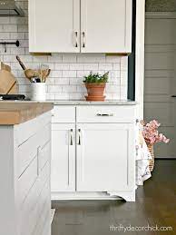 Diy Furniture Feet For Basic Kitchen Cabinets From Thrifty Decor Chick