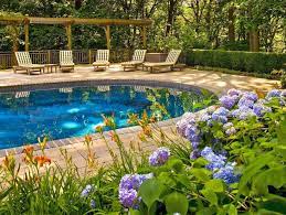 Pool landscape lighting ideas for your backyard. 40 Swimming Pool Landscaping Ideas Hgtv