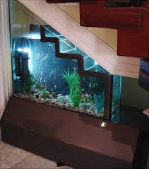 No Room For An Aquarium Think Again 20 Unusual Places In Your Home For Fish Tanks Home Stairs Design Amazing Aquariums Cool Fish Tanks