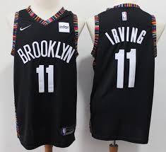The jersey is light blue with white. Men S Brooklyn Nets 11 Kyrie Irving Black City Edition Nike Swingman Stitched Nba Jersey Nets Jersey Nba Jersey Nba
