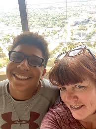 How to explain to a 13-year-old boy that his mother is no longer living  next door due to domestic violence and drug issues?