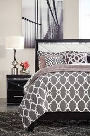 Fancee Queen Panel Bed Relax In Modern Luxury With The Fancee Black Laqcuer Collection By Ashley Furniture This Bed Features A Sleek Black Fin Queen Panel Beds