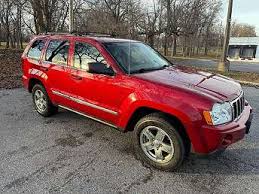 Image result for Flame Red 2005 Jeep