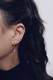 dainty gold earrings gold drop earrings gold dangle etsy in 2021 ear jewelry ear piercings earings piercings