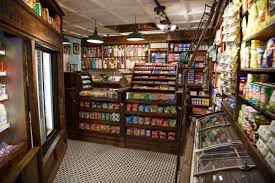 Small Grocery Store By 1900 S Okay Who Wouldn T Come In A Store Just To Try Out The Rolling Ladder Grocery Store Design Small Store Design Store Design