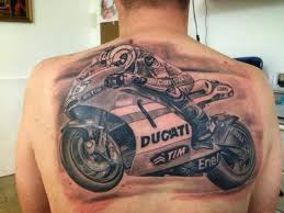 First introduced in the decade of 1940s, bikers tattoo were usually affiliated to represent a particular motorcycle group. Realistic Grey Ducati Motorcycle Tattoo On Man Upper Back