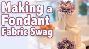How To Make A Fondant Fabric Swag Cake Tutorial Fondant Cake Tutorial Cake Decorating Tutorials Wedding Cake Tutorial