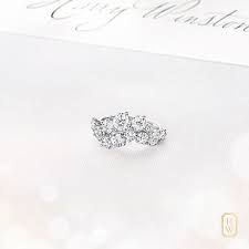 Cheers To Brilliant Celebrations And The House S Sparkling Cluster Diamond Ring Harrywinston Beautiful Diamond Engagement Ring Fine Diamond Jewelry Diamond