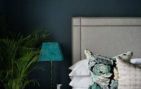 Small dark bedroom with hardwood flooring. So Your Style Is Darkly Romantic