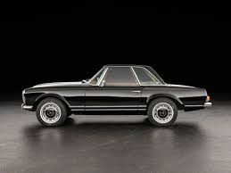 Deze Mercedes Benz 280 Sl Uit 1970 In De Volmaakte Kleurencombinatie Van Zwarte Lak En Bruin Interieur Wordt Te Koop Aangebo Mercedes Benz Mercedes Sl Mercedes