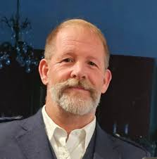 What is this old glass and metal object found in a backyard?