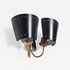 Whether you want to add a unique flair to your living room or hallway with a modern wall sconce or you want to distinguish your lighting style with a beautiful traditional sconce, we have a large wall sconce selection for you to choose from, including our exclusive sconces available only from. Gio Ponti Gio Ponti Black Italian Double Wall Sconce Modern Vintage Italy 1950s