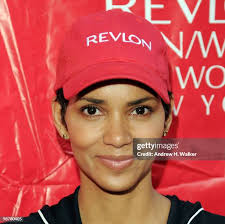 Revlon CEO Alan Ennis, Jessica Alba and Revlon CFO Chris Elshaw... News  Photo