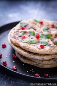 Peshwari Naan A Sweet Nutty Indian Bread Greedy Gourmet Recipe Indian Bread Recipes Indian Bread Bread Method