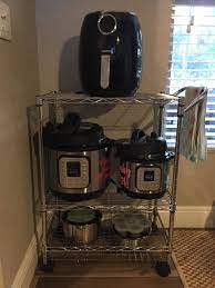 These versatile carts also make a great workspace to prepare food items. 6 Instant Pot Storage Solutions Besides The Beloved Target Cart Pot Storage Kitchen Appliance Storage Appliances Storage