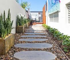 These large stepping stones integrate nicely with the landscape creating a natural and welcoming entrance. Bluestone Premium Stepping Stones