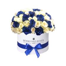 Our florists offers the finest collection of flowers in an artistically crafted packaging. Blue Rose Bouquets Send Stunning Blue Roses In Dubai Abu Dhabi