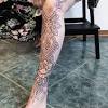 5 girls tattoos on leg; 1