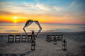 Hotel wedding venues in outer banks seamlessly combine convenience and style. Sam And Lee S Outer Banks Sunrise Ceremony I Do Obx Weddings Events